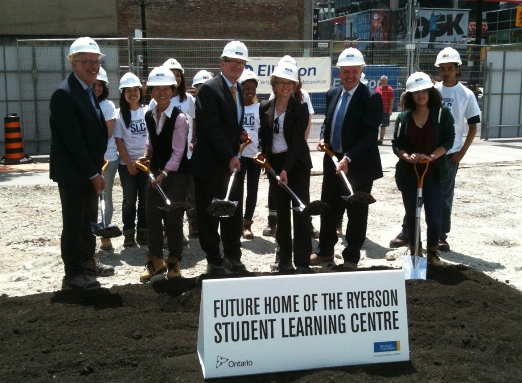 Ryerson University students, staff and government officials took part in the official groundbreaking ceremony for the school's new 155,463 sq. ft. Student Learning Centre in downtown Toronto on May 30, 2012. From left: Sheldon Levy, president, Ryerson University; Coun. Kristyn Wong-Tam; Alan Shepard; Julia Hanigsberg; Kevin Flynn, parliamentary secretary and Minister of Training, Colleges and Universities; and Marwa Hamad (Ryerson University students in background).