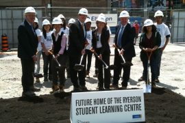 Ryerson University students, staff and government officials took part in the official groundbreaking ceremony for the school's new 155,463 sq. ft. Student Learning Centre in downtown Toronto on May 30, 2012. From left: Sheldon Levy, president, Ryerson University; Coun. Kristyn Wong-Tam; Alan Shepard; Julia Hanigsberg; Kevin Flynn, parliamentary secretary and Minister of Training, Colleges and Universities; and Marwa Hamad (Ryerson University students in background).