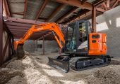 Reduced tail swing excavators