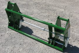 Attachment adapter for John Deere loaders