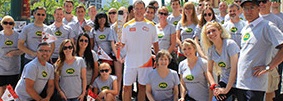 PCL's president of Eastern Canada, Jim Dougan (centre), proudly carried the Toronto 2015 Pan Am/Parapan Am Games torch through the streets of Toronto