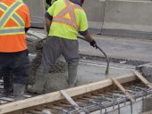 workers_construction_concrete_compactor