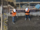 Civil engineers inspecting the work progress in a construction site