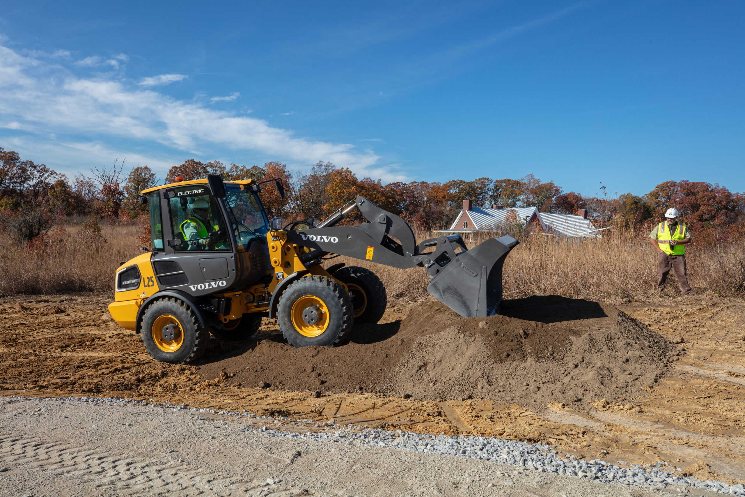 Electric loader spreads soil